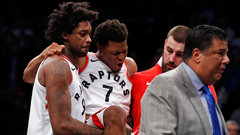 Lowry carried off court after suffering acute back spasm against Nets
