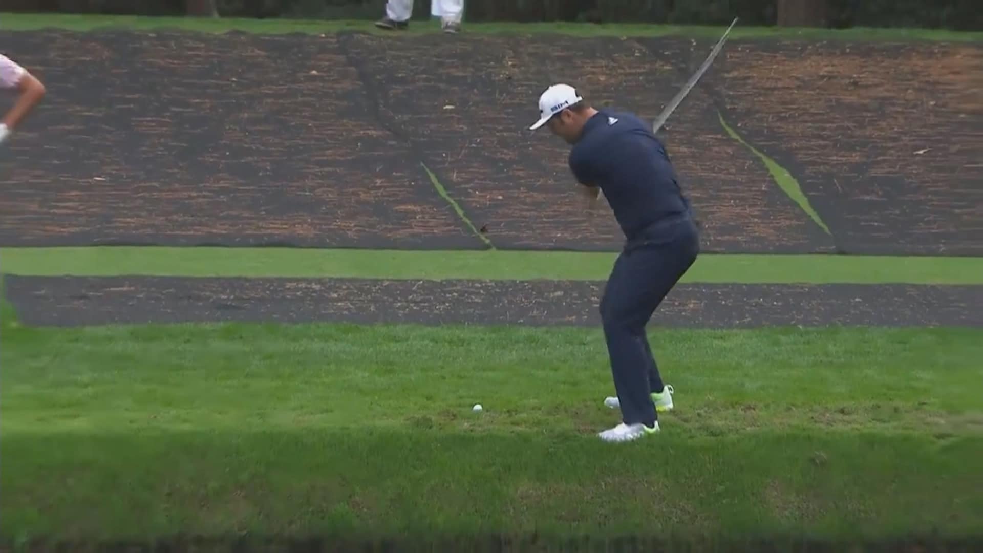 Golfer skips ball across water and right into the hole for insane shot