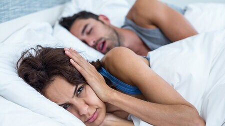 Article argues partners should sleep in different beds Article argues partners should sleep in different beds