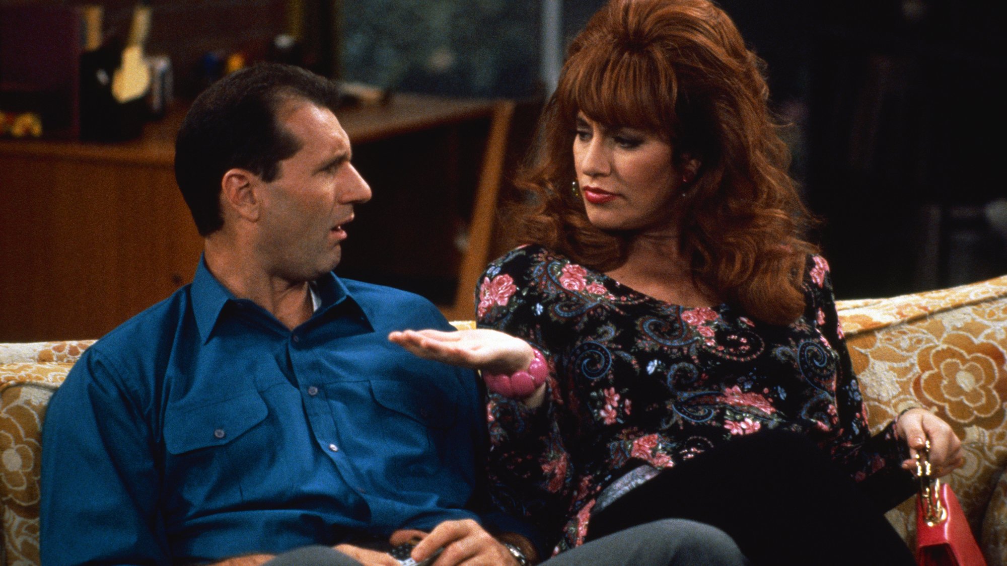 Al and Peg Bundy tolerate each other while raising children Bud and Kelly. 