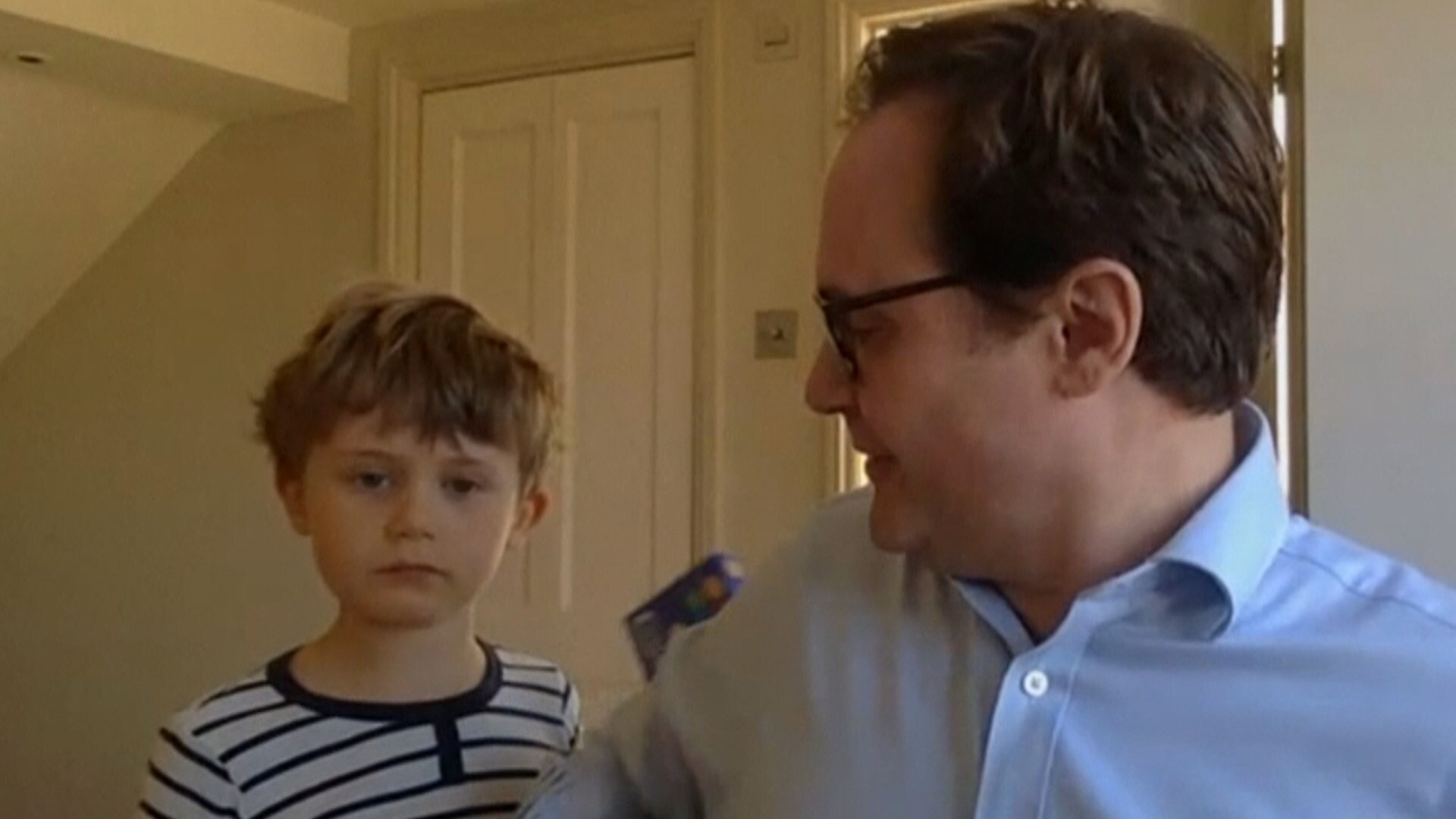 Kids crash British law maker's live TV interview