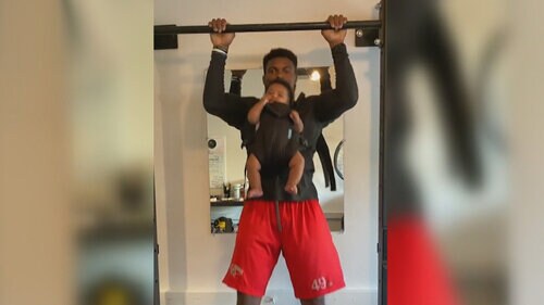 Dad incorporates new baby into workout seamlessly Dad incorporates new baby into workout seamlessly