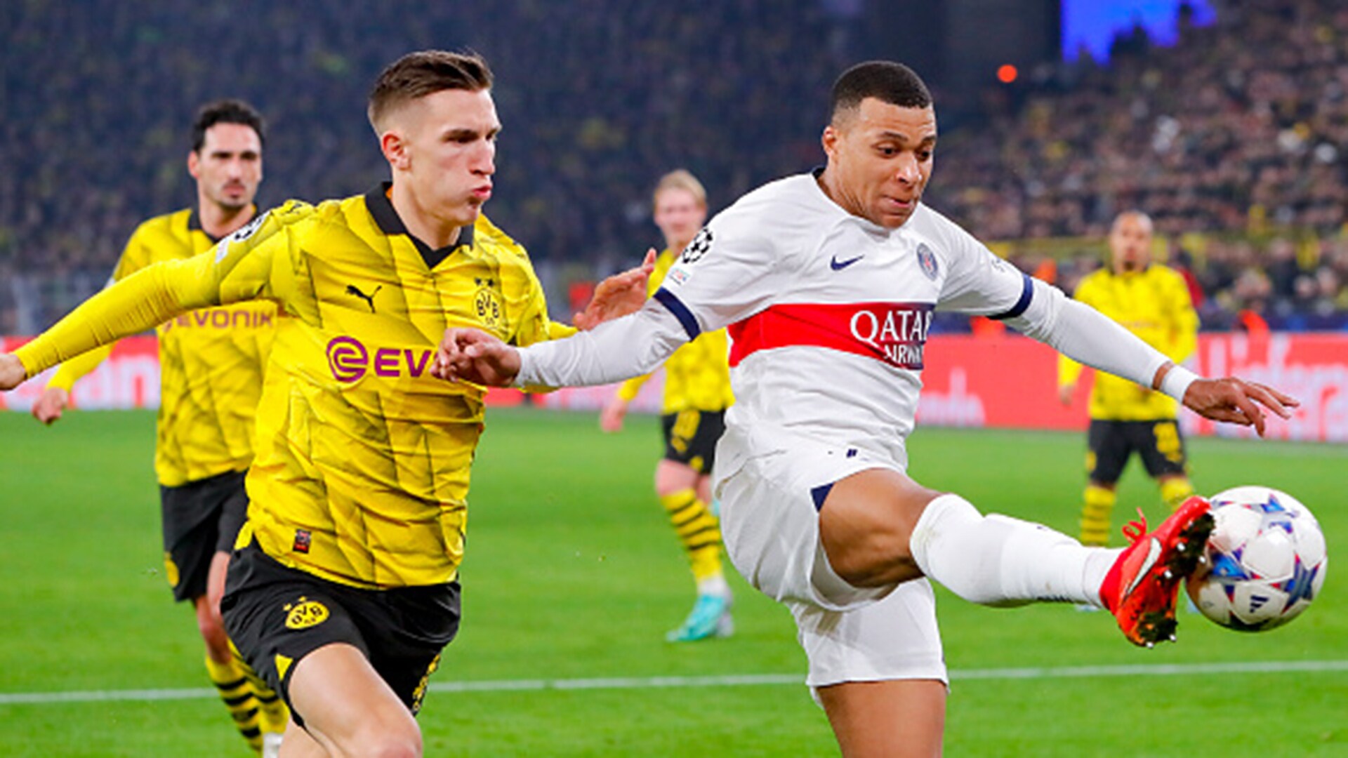 PSG squeezes into Champions League knockout stage with 1-1 draw at Borussia  Dortmund