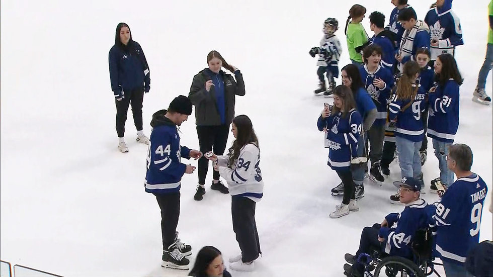 Fans at Easter Seals Kids skate ask Rielly when he's going to score 