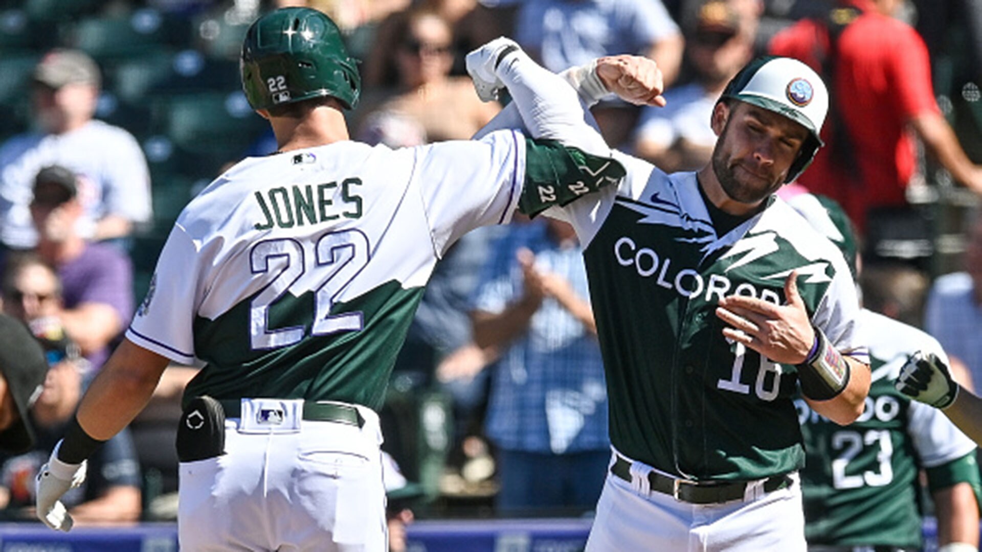 Kris Bryant hits one of the Rockies' four homers in a 7-3 win over