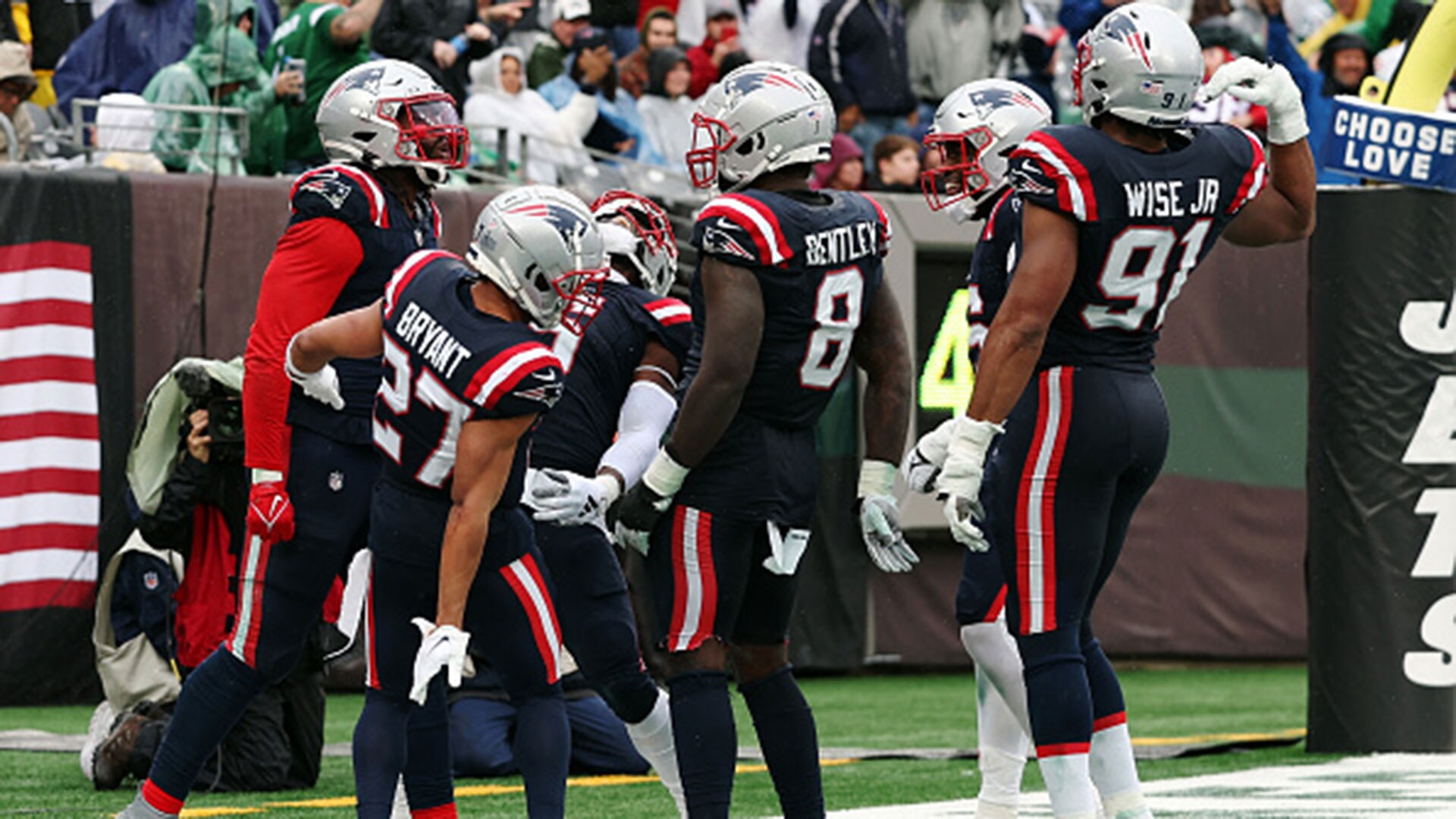 New York Jets quarterback Zach Wilson (2) talks to his offensive line  between downs against the New England Patriots during an NFL football game,  Sunday, Sept. 24, 2023, in East Rutherford, N.J. (