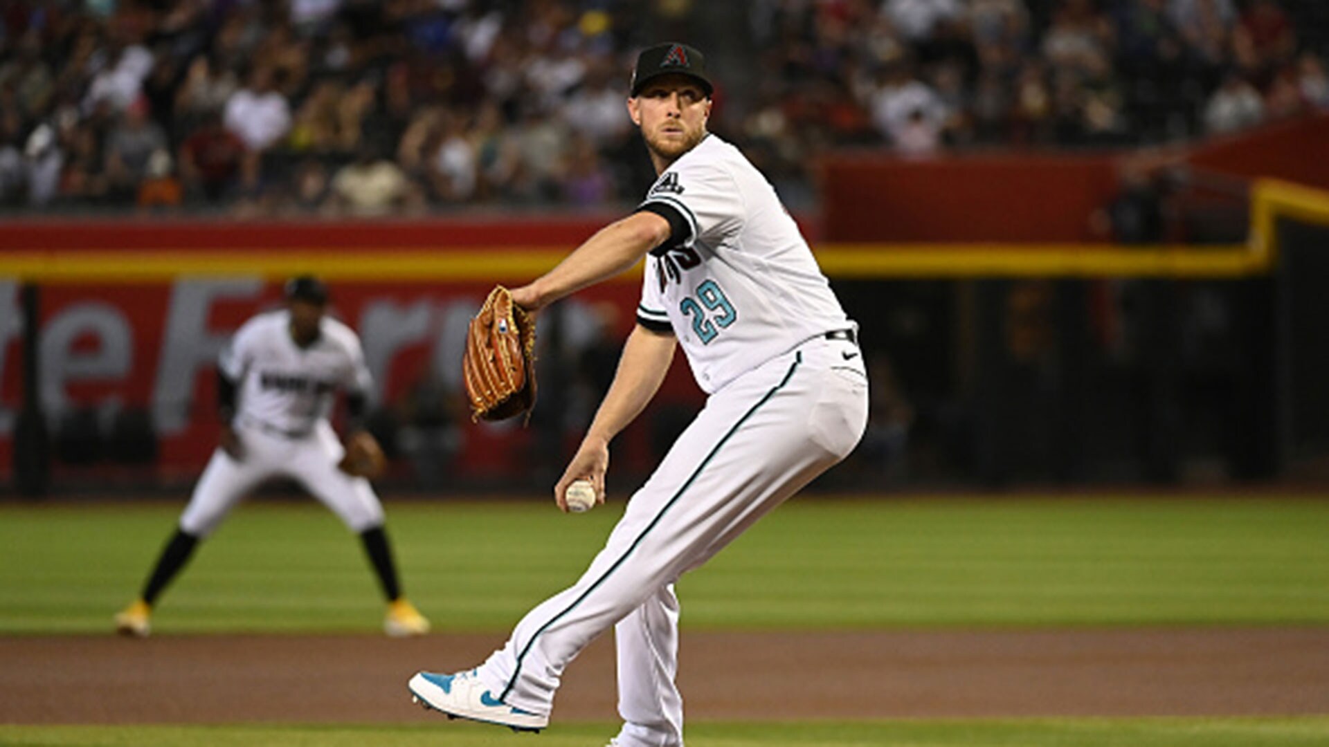 Kelly strikes out 12 in 7 innings, Diamondbacks beat Rockies 4-2