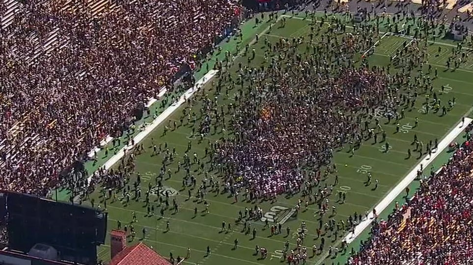 Colorado fans storm field after Deion Sanders' win over Nebraska