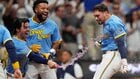 Caleb Durbin's walk-off home run sparks wild Brewers celebrations.
