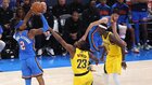 Shai Gilgeous-Alexander dances with Aaron Nesmith before putting in the midrange jumper.
