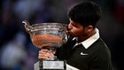 Carlos Alcaraz rallied to defeat World No. 1 Jannik Sinner 4-6, 6-7, 6-4, 7-6, 7-6 in a brilliant come-from-behind effort to take his...